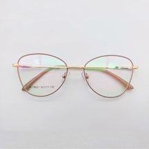 Armação de óculos feminino olho de gato em metal dourado e azul. Design sofisticado, narigueiras ajustáveis e hastes anatômicas. Leve, resistente e ideal para lentes de até 6 graus.