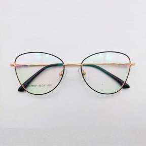 Armação de óculos feminino olho de gato em metal dourado e azul. Design sofisticado, narigueiras ajustáveis e hastes anatômicas. Leve, resistente e ideal para lentes de até 6 graus.