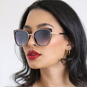 Óculos de Sol Feminino Cat Eye Vintage, armação em acetato italiano e metal anticorrosão. Lentes degradê com proteção UV400, design sofisticado e leve para máximo conforto.