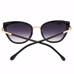 Óculos de Sol Feminino Cat Eye Vintage, armação em acetato italiano e metal anticorrosão. Lentes degradê com proteção UV400, design sofisticado e leve para máximo conforto.