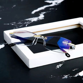 Óculos de grau masculino sem aro, com lentes anti luz azul e proteção UV. Design leve e sofisticado, armação em resina resistente e ajuste confortável para uso prolongado.